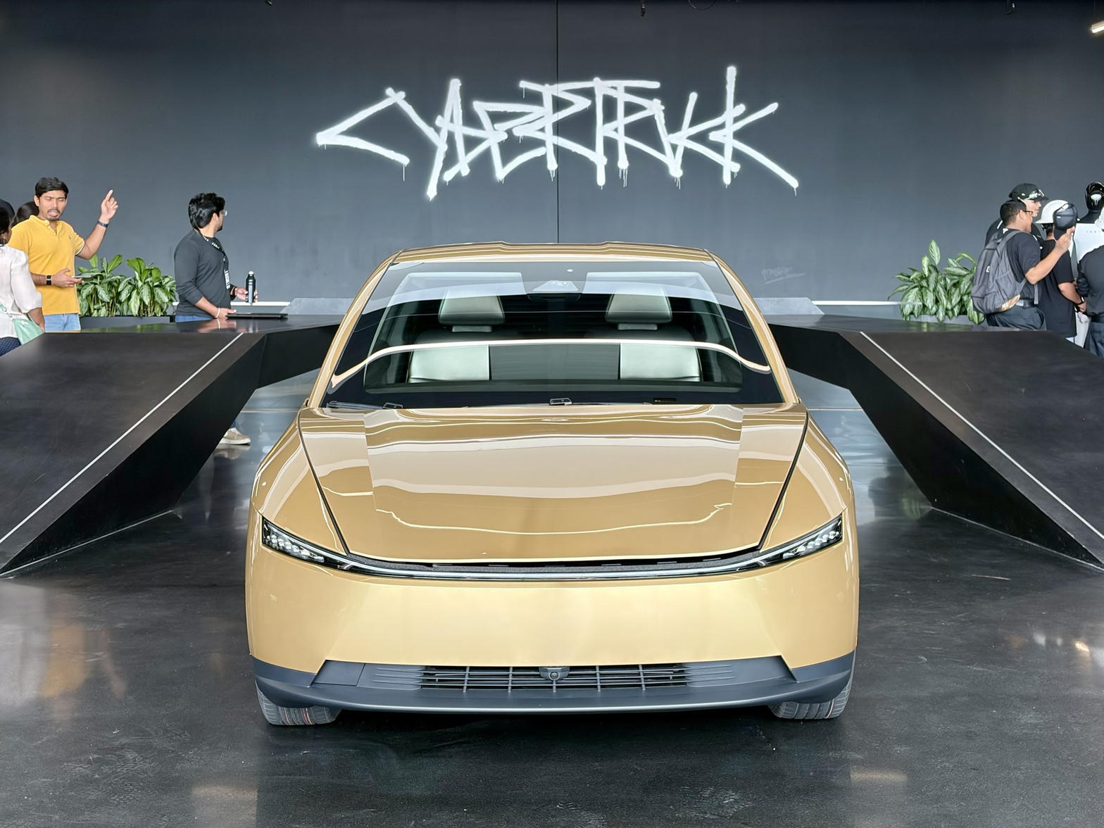 Front view of gold Tesla Cybercab